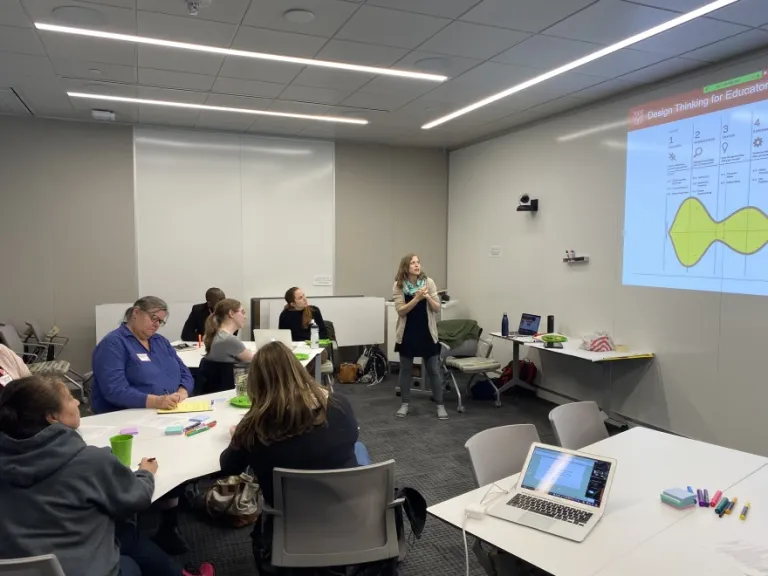 K-12 Climate Across Curriculum Program Coordinator Alex Morales-Heil talks to teachers from the St. Louis region about how they can discuss climate change in the classroom. Photo: Washington University Climate Change Program