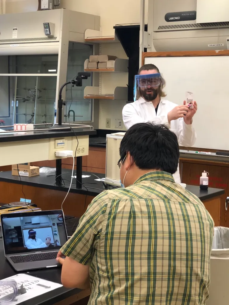 Lab supervisor Matt Autry and faculty assistant Ruowen Pei record a general chemistry lab.