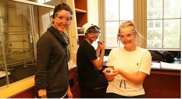 Graduate student Susan Gelman overseeing a slime-making chemistry experiment