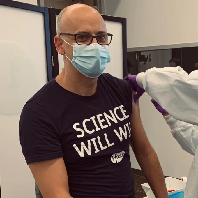 Justin Sperry, MA ’05, PhD ’08, is senior director of analytical research and development at Pfizer, and he leads a team responsible for developing the testing strategies. Here, he gets a “dose of his own medicine,” he says.